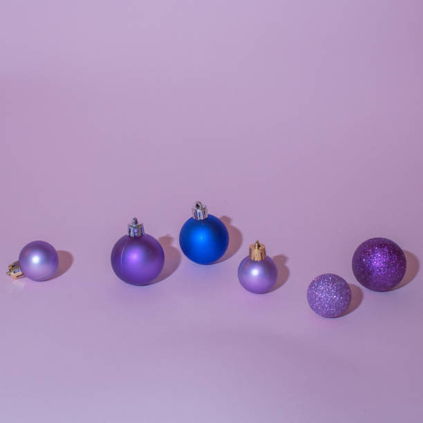 istock New year decorations , colorful balls on pink background. Flat lay concept. 1420166749