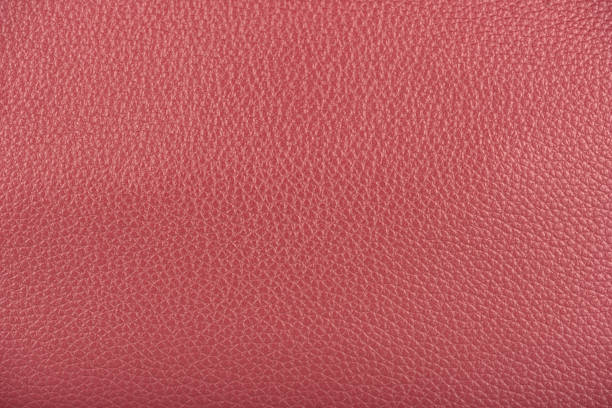 istock Full frame of burgundy colored faux leather surface. 1420167513