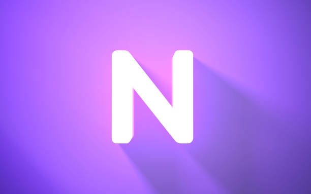 istock Neon Letter N on Purple Background (close-up) 1420170731