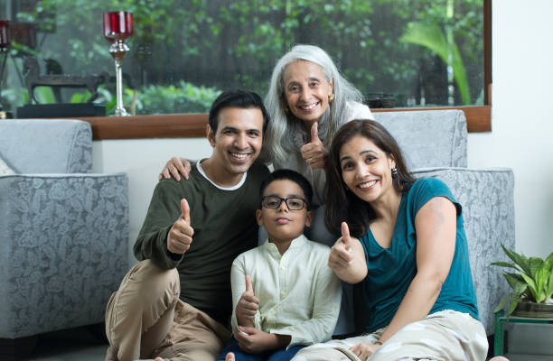 istock Multi-Generation Family Giving Thumbs Up Gesture 1420171025