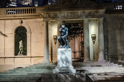 Copy of The Thinker of Rodin t the entrance of the Rosin museum during summer evening in Philadelphia