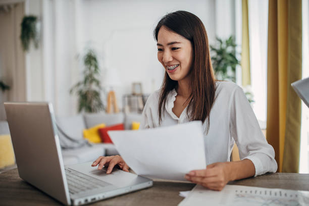 istock Woman working in home office 1420176359