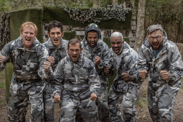 istock A middle aged paintball team on the field of play 1420182064