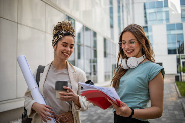 istock Female college students after lecture 1420186493