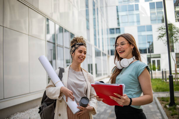 istock Female college students after lecture 1420186904