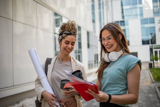 istock Female college students after lecture 1420186951
