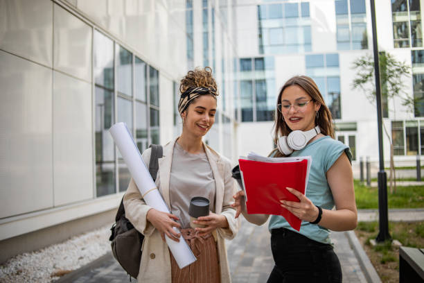 istock Female college students after lecture 1420187131