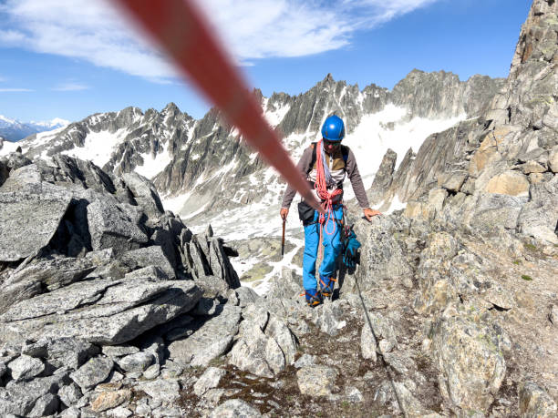 istock Climbing rope leads to mountain guide on glacier 1420188996