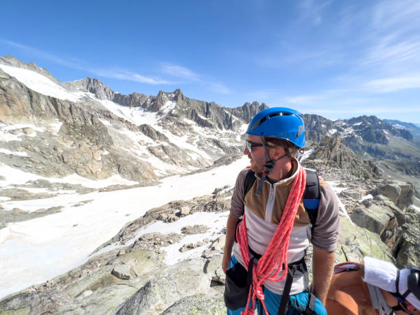 istock Happy mountaineer on mountain summit 1420189144