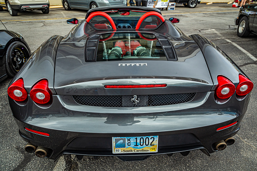 Tybee Island, GA - October 14, 2017: Rear view of a 2006 Ferrari F430 Spider Roadster at a local car show.