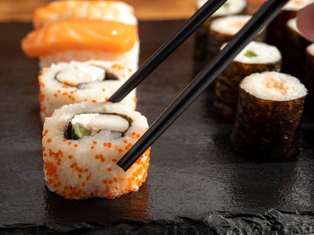 istock Japanese kitchen. Sushi on a dark background. 1420190357
