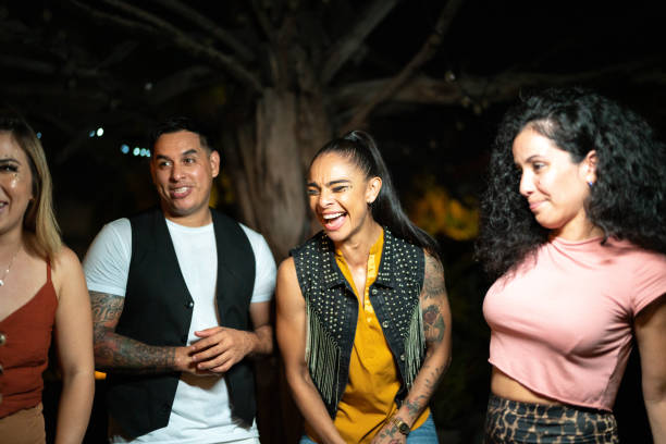 istock Friends talking and having a fun at night 1420195068