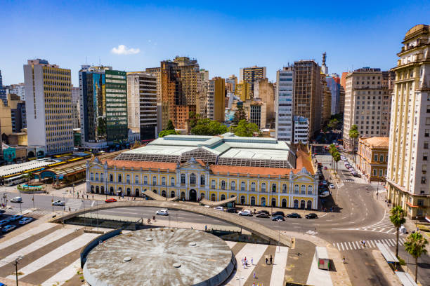 Porto Alegre Public Market , Rio Grande do Sul, Brazil Historic building with many people shopping and walking around porto grande stock pictures, royalty-free photos & images