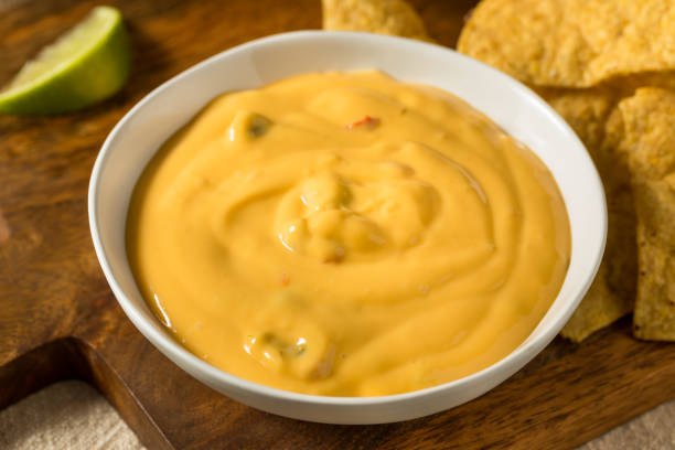 istock Homemade Yellow Queso Cheese Dip with Tortilla Chips 1420203835