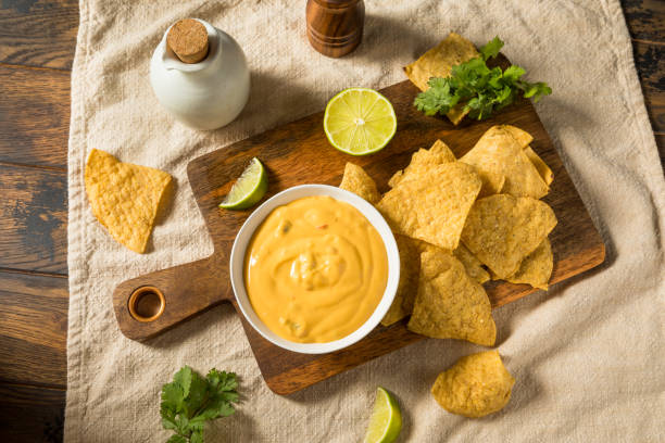 istock Homemade Yellow Queso Cheese Dip with Tortilla Chips 1420203859