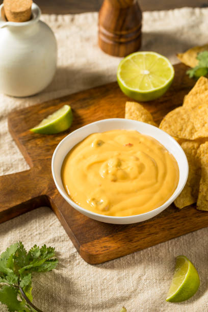 istock Homemade Yellow Queso Cheese Dip with Tortilla Chips 1420203864