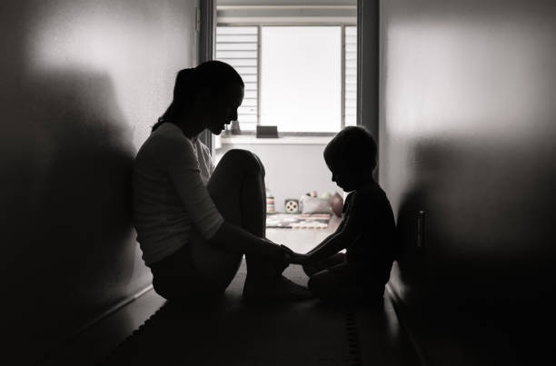 istock Sad mother and child. Family domestic issues and problems. 1420208761