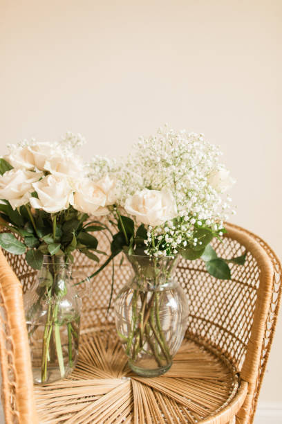 Soft Cream-Colored Roses with Baby's Breath & Greenery in a Glass Vase in West Palm Beach, Florida for a Simple & Sweet First Birthday Party Themed 