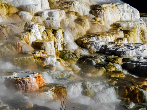 Close up view of colorful terraces with steam, Mammoth Hot Springs, Yellowstone.