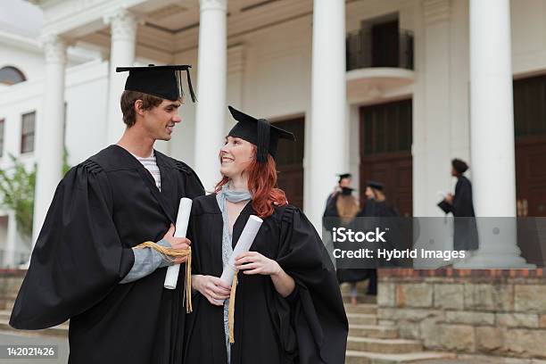 Graduates With Their Degrees On Campus Stock Photo - Download Image Now - 18-19 Years, 20-24 Years, Achievement