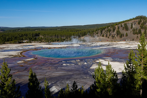 Landscape of orange swamp area with natural texture on land surface inside the famous Grand Prismatic Spring of Yellowstone National Park, Wyoming, USA.