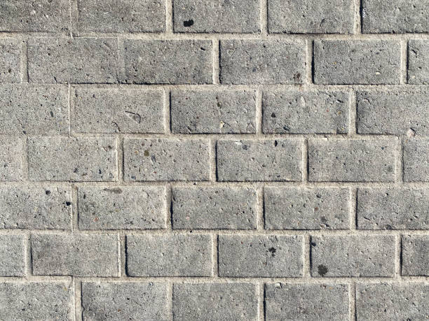 istock concrete retaining wall cinder block cement aggregate breeze block building office warehouse house garden yard backyard fence foundation facade 1420218728
