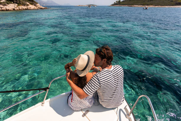 istock Couple sitting on the boat deck 1420223219