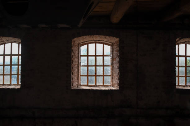 istock Medieval windows in old building as an dark architectural background 1420234216