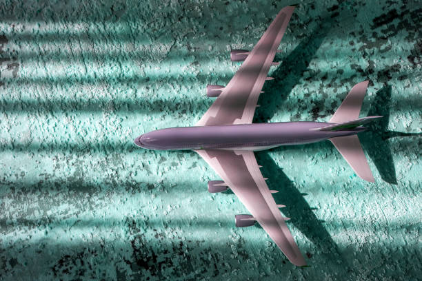 istock creative effect with sun light beam, airplane aircraft toy on blue green background with lines, travelling concept 1420234577