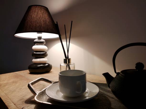 istock Coffee table with household items in the twilight. 1420238811
