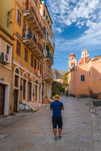 A tourist taking a photo in Corfu. Greece
