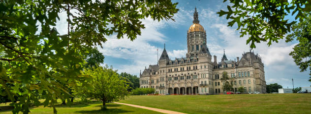 Connecticut State Capitol Government building in Hartford Connecticut State Capitol Government building panorama in Bushnell Park downtown Hartford Connecticut USA connecticut state capitol building stock pictures, royalty-free photos & images