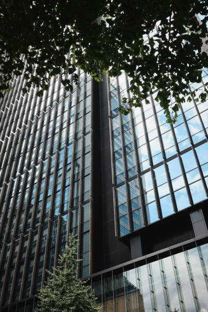istock Urban Office Building Closeup with Cloudy Sky 1420253937