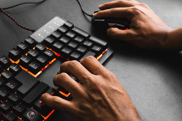 istock Hands of a gamer playing on pc. 1420275684