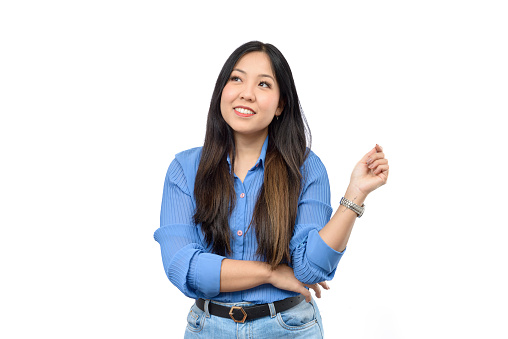 Young asian woman in photo studio with white background.