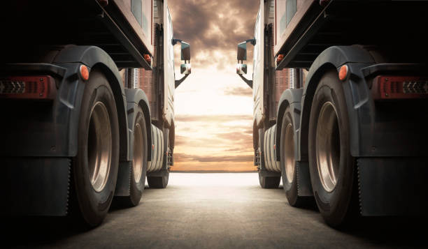 semi trailertrucks on parking with the sunset sky. shipping container truck. delivery transit. engine diesel truck tractor. industry freight trucks logistics cargo transport. - truck semi truck freight transportation trucking imagens e fotografias de stock