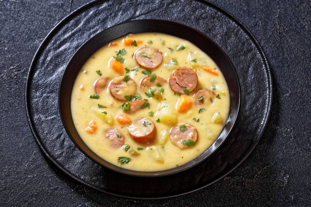 istock German potato soup with sausages in bowl 1420303247