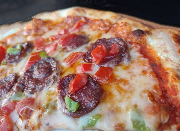 istock Mixed vegetable and sausage pepperoni pizza slice at Istanbul turkey 1420321877