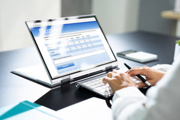 istock Woman Filling Survey Poll Or Form 1420323256