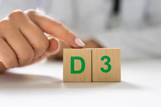 Vitamin D3 Test. Medical Doctor Hand And Pharmacy