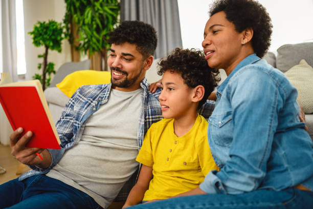 istock African-American family reading a book 1420327214