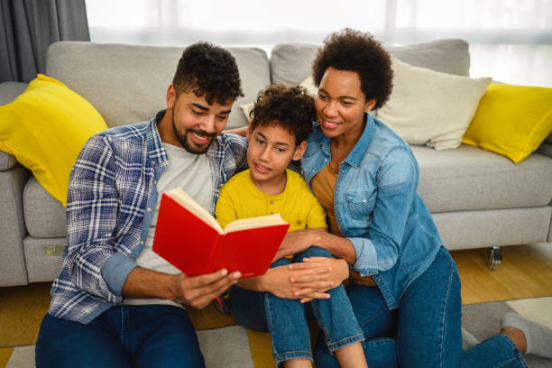 istock African-American family reading a book 1420327224