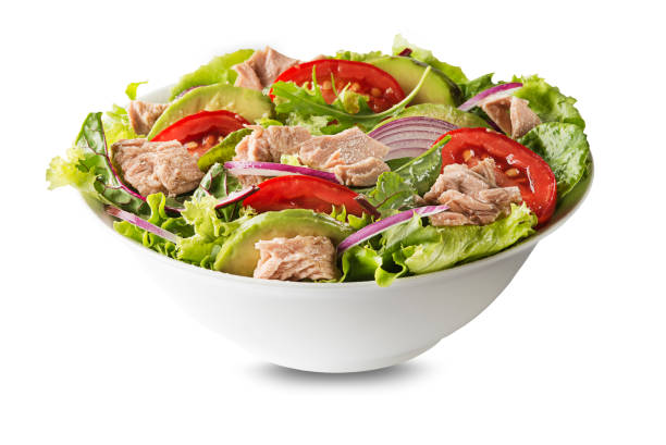 Tuna salad with lettuce, avocado and tomato stock photo