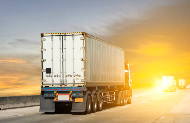 istock industrial Transporting Land transport by Container truck. 1420344578