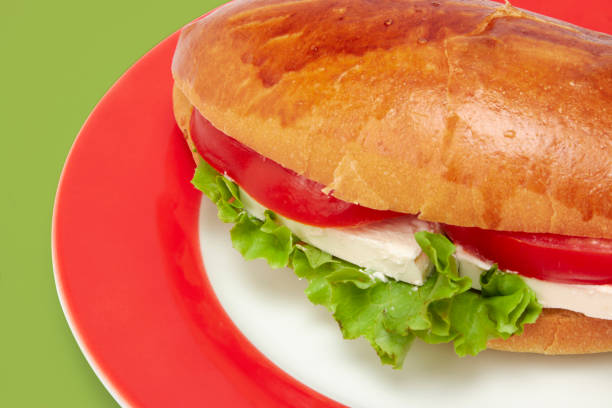 Bread roll for breakfast covered with healthy fresh ingredients