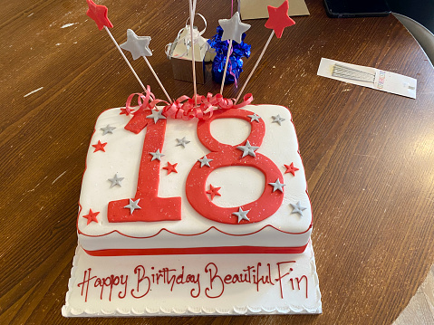 Birthday cake with sparklers for disabled blind boy