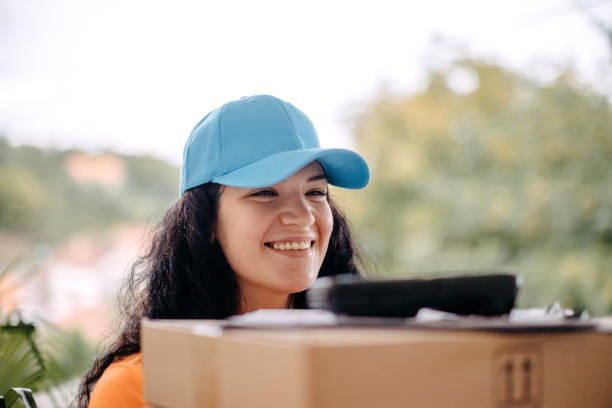 istock Woman delivery person 1420429465