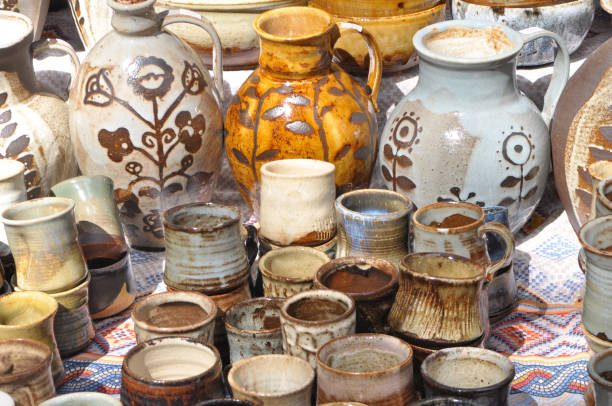 A variety of pottery made by folk craftsmen from clay.