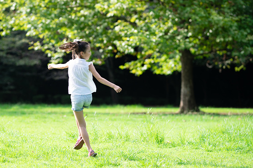 girl running in the park