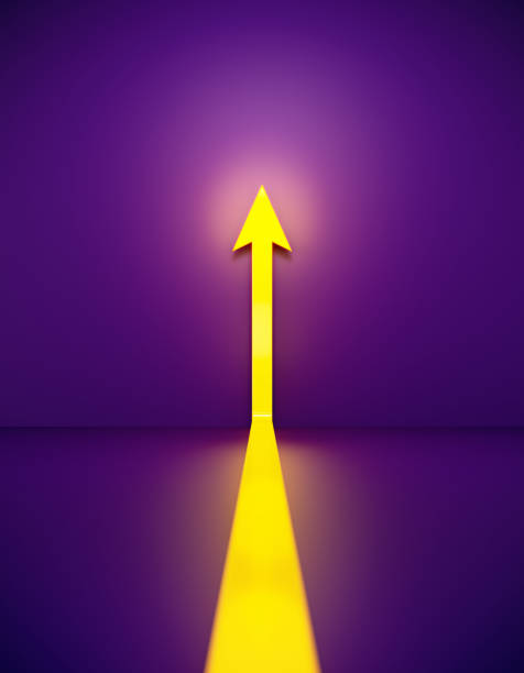 istock Yellow Arrow Glowing Before Purple Background 1420467665
